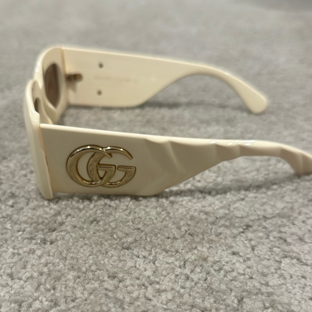 Cream colored rectangle brown lens Gucci sunglasses